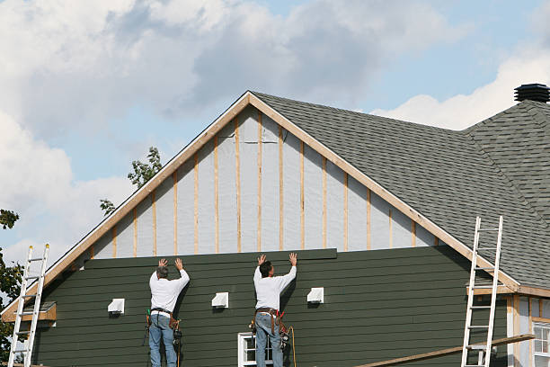 Professional Vinyl Siding technician working in Victoria, MN